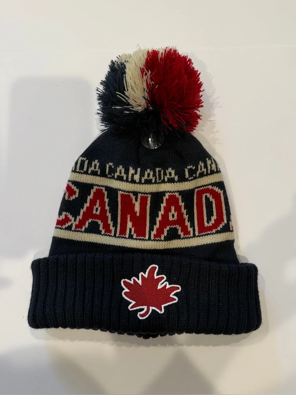 Canada Knit Pom Beanie Hat - Navy, Red, Cream